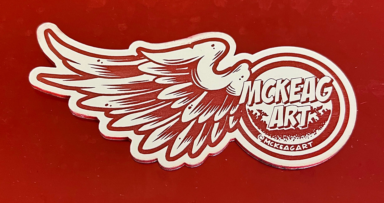 Winged McKeag Art logo